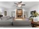 Gathering room with brick fireplace, hardwood floors, and comfortable seating at 270 Emerald Lake Dr, Fayetteville, GA 30215