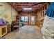 Unfinished basement room with storage and window at 270 Emerald Lake Dr, Fayetteville, GA 30215