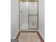 Clean shower with gold accents and glass enclosure at 270 Emerald Lake Dr, Fayetteville, GA 30215