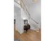 Bright entryway with hardwood floors, elegant staircase, and charming console table at 270 Emerald Lake Dr, Fayetteville, GA 30215