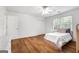 Bright bedroom with double closets and wood-look floors at 270 Emerald Lake Dr, Fayetteville, GA 30215
