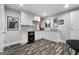 Basement kitchenette with white cabinets and granite counters at 270 Emerald Lake Dr, Fayetteville, GA 30215
