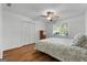 Bedroom with double closets and ceiling fan at 270 Emerald Lake Dr, Fayetteville, GA 30215