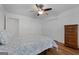 Bedroom with wood-look floors and ceiling fan at 270 Emerald Lake Dr, Fayetteville, GA 30215