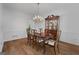 Formal dining room with wood table, chairs, and a china cabinet at 270 Emerald Lake Dr, Fayetteville, GA 30215