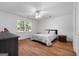 Spacious bedroom with wood-look floors and ceiling fan at 270 Emerald Lake Dr, Fayetteville, GA 30215