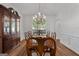 Elegant dining room featuring a wood table and chairs, and chandelier at 270 Emerald Lake Dr, Fayetteville, GA 30215
