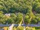 Aerial view showing home's setting and wooded lot at 270 Emerald Lake Dr, Fayetteville, GA 30215