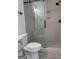 Bathroom with walk-in shower, toilet and vanity at 150 Dockside Dr # 382, Fayetteville, GA 30215