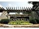 The Canoe Club community entrance sign at 150 Dockside Dr # 382, Fayetteville, GA 30215