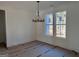 Bright dining room with large windows and chandelier at 150 Dockside Dr # 382, Fayetteville, GA 30215