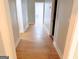 Hallway with hardwood floors and doors at 674 Jett Nw St, Atlanta, GA 30318