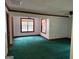 Spacious living room featuring wall-to-wall carpeting at 4112 Jodeco Rd, Stockbridge, GA 30281