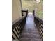 Wooden stairs leading from deck to backyard at 2734 Laurel View Dr, Snellville, GA 30039