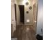 Hallway with light gray walls and wood flooring at 2734 Laurel View Dr, Snellville, GA 30039