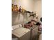 Laundry room with washer, dryer, and shelving for storage at 2734 Laurel View Dr, Snellville, GA 30039