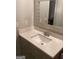 Bathroom features vanity with quartz countertop and sink at 2734 Laurel View Dr, Snellville, GA 30039