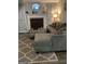 Living room with sectional sofa and fireplace at 2734 Laurel View Dr, Snellville, GA 30039