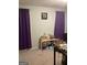 Spacious bedroom with purple curtains and ample closet space at 2734 Laurel View Dr, Snellville, GA 30039