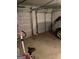 Two-car garage with space for storage and a stationary bike at 2734 Laurel View Dr, Snellville, GA 30039