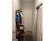 Hallway with coat rack, door, and built-in closet at 2734 Laurel View Dr, Snellville, GA 30039
