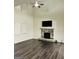 Bright living room featuring a stone fireplace and high ceilings at 4020 Red Canoe Bnd, Lilburn, GA 30047