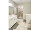 Spa-like bathroom with walk-in shower and modern fixtures at 4020 Red Canoe Bnd, Lilburn, GA 30047