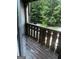 Private balcony with wooded views at 1505 Camelot Dr, College Park, GA 30349