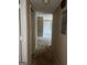 Clean hallway with carpeted floors and access to other rooms at 1505 Camelot Dr, College Park, GA 30349