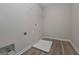 Laundry room with white wire shelving and vinyl flooring at 2970 Fareed St, Douglasville, GA 30135