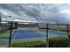 Community tennis courts with fencing and lighting at 2970 Fareed St, Douglasville, GA 30135