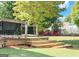 Wooden deck with steps leading to the yard at 2206 Sugar Maple Nw Ct, Acworth, GA 30101