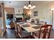 Bright dining room with a fireplace and hardwood floors at 2206 Sugar Maple Nw Ct, Acworth, GA 30101