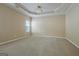 Bright bedroom featuring carpeted floors and a ceiling fan at 160 Emily Park, Fayetteville, GA 30215