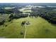 Aerial view of house and property with large green space at 1530 Highway 11, Mansfield, GA 30055