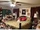 Large bedroom with king-size bed and lots of dolls at 1530 Highway 11, Mansfield, GA 30055