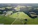 Aerial view of house and property with large green space at 1530 Highway 11, Mansfield, GA 30055
