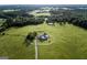 Aerial view of house and property with large green space at 1530 Highway 11, Mansfield, GA 30055