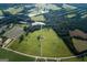 Aerial view of house and property with large green space at 1530 Highway 11, Mansfield, GA 30055