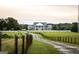 Impressive two-story home with a long driveway at 1530 Highway 11, Mansfield, GA 30055