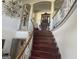 Elegant curved staircase in a large foyer at 1530 Highway 11, Mansfield, GA 30055
