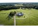 House on a large lot with a circular driveway and white fence at 1530 Highway 11, Mansfield, GA 30055