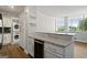 Open kitchen with granite counters and breakfast bar at 3060 Nw Pharr Cts # 317, Atlanta, GA 30305