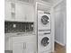 Stackable washer and dryer tucked away in a stylish kitchen at 3060 Nw Pharr Cts # 317, Atlanta, GA 30305