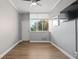 Bedroom with wood floors and a window view at 3060 Nw Pharr Cts # 317, Atlanta, GA 30305