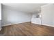 Bright living room with hardwood floors and kitchen bar at 3060 Nw Pharr Cts # 317, Atlanta, GA 30305