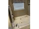 Bathroom with a bathtub, and plenty of counter space at 5496 Vanity Joys Ln, Ellenwood, GA 30294