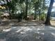Wooded backyard with a large, grassy area at 2360 Green Forrest Dr, Decatur, GA 30032