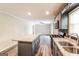 Open concept kitchen with granite counters and breakfast bar at 2868 Cocklebur Cove Ct, Decatur, GA 30034