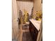 Bathroom with shower/tub combo and patterned shower curtain at 1158 Folkstone Dr, Mcdonough, GA 30253
